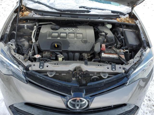 Photo 11 from auction – 2017 TOYOTA COROLLA with VIN 2T1BURHE1HC884405