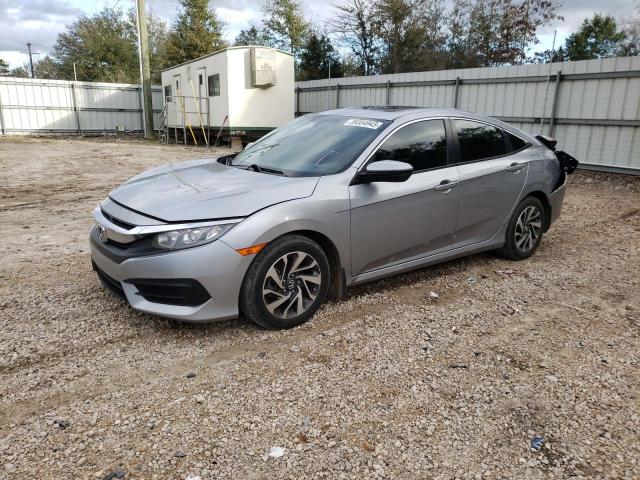 HONDA CIVIC EX 2018 with VIN 19XFC2F71JE020929 - Photo from auction