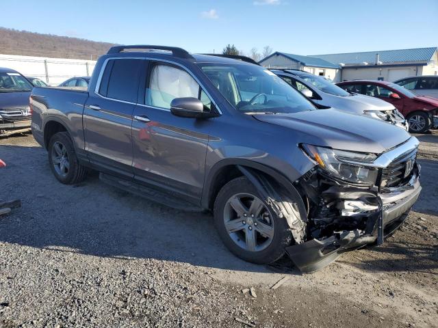 Photo 4 from auction – 2022 HONDA RIDGELINE with VIN 5FPYK3F74NB001834