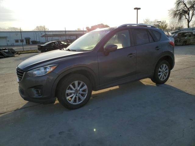 Photo 1 from auction – 2016 MAZDA CX-5 TOURI with VIN JM3KE2CYXG0755570
