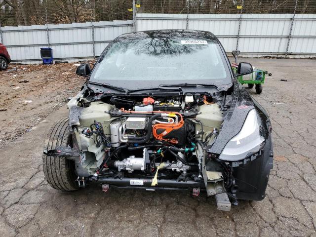 Photo 5 from auction – 2022 TESLA MODEL 3 with VIN 5YJ3E1EA9NF101715