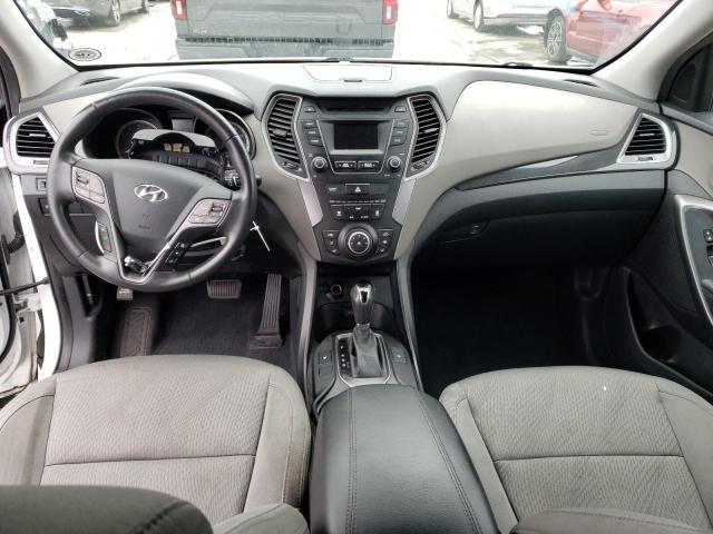 Photo 8 from auction – 2014 HYUNDAI SANTA FE S with VIN 5XYZU3LB1EG213972