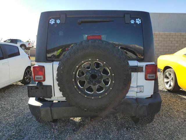 Photo 6 from auction – 2011 JEEP WRANGLER U with VIN 1J4HA3H10BL574933