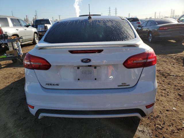 Photo 6 from auction – 2015 FORD FOCUS SE with VIN 1FADP3F20FL221487