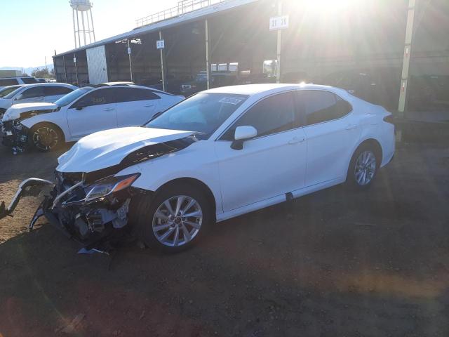TOYOTA CAMRY LE 2022 with VIN 4T1C11AK4NU045809 - Photo from auction
