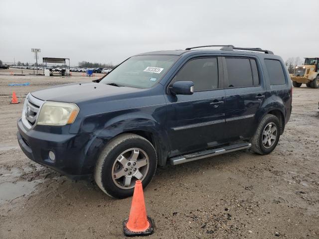 HONDA PILOT TOUR 2011 with VIN 5FNYF3H90BB032120 - Photo from auction