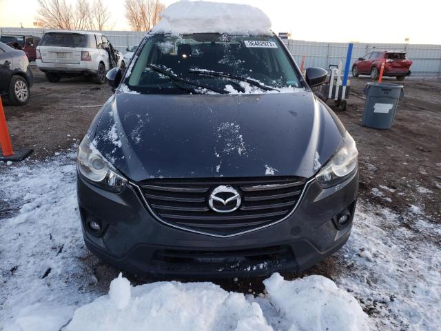 Photo 5 from auction – 2014 MAZDA CX-5 SPORT with VIN JM3KE4BE8E0422980