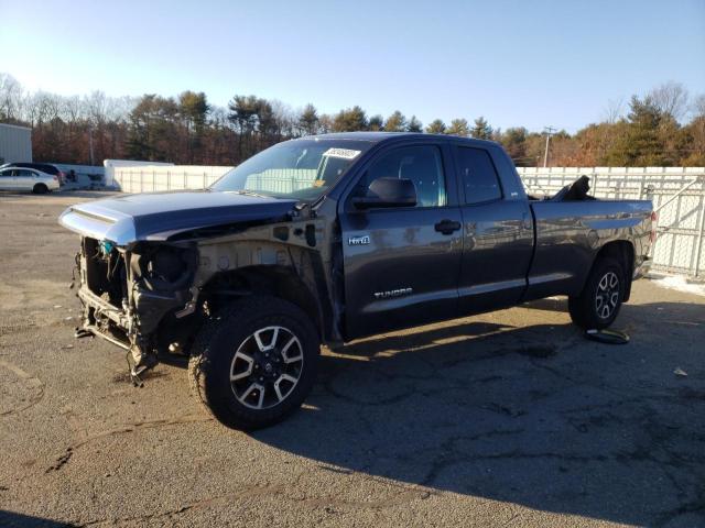 TOYOTA TUNDRA DOU 2014 with VIN 5TFCY5F15EX017801 - Photo from auction