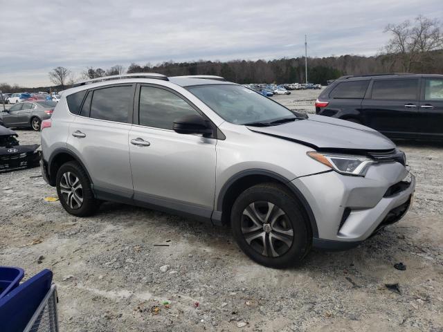 Photo 4 from auction – 2018 TOYOTA RAV4 LE with VIN JTMZFREV8JJ165014
