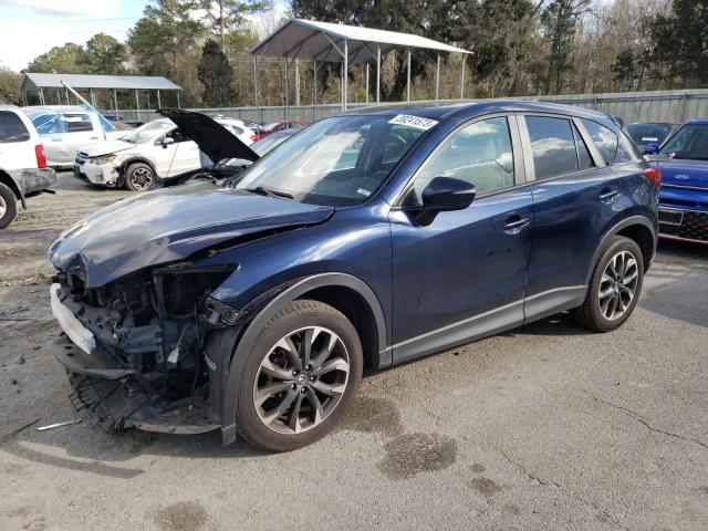MAZDA CX-5 GT 2016 with VIN JM3KE4DY9G0879002 - Photo from auction