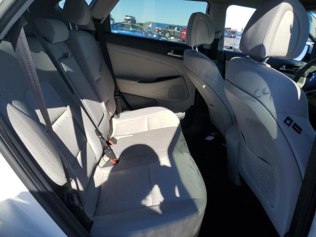 Photo 11 from auction – 2018 HYUNDAI TUCSON SE with VIN KM8J2CA48JU618996