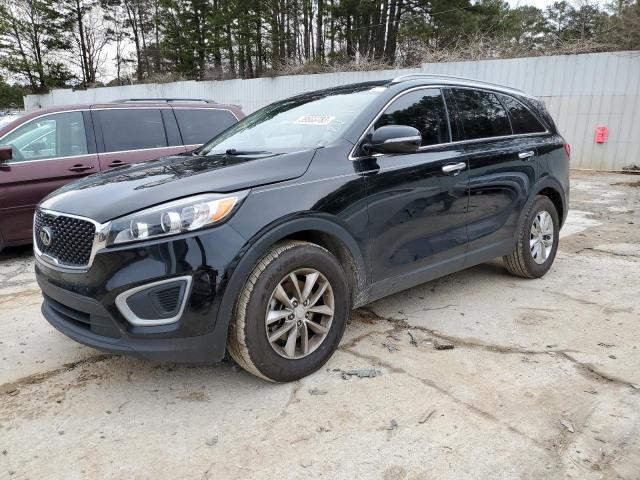 KIA SORENTO LX 2016 with VIN 5XYPG4A36GG037293 - Photo from auction