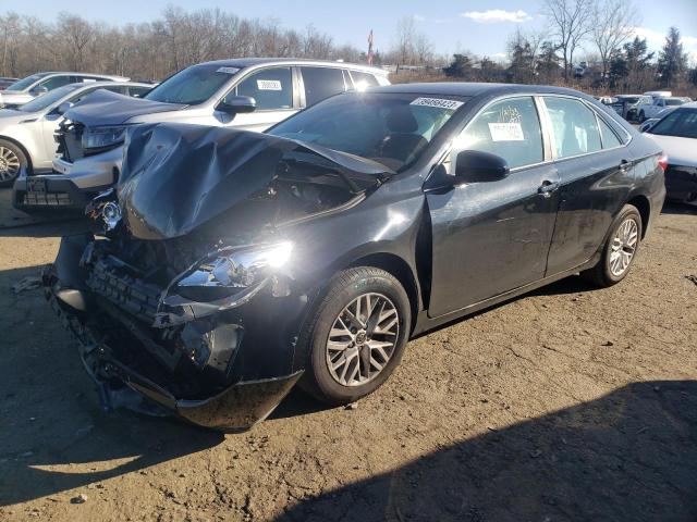 TOYOTA CAMRY LE 2016 with VIN 4T4BF1FK7GR584617 - Photo from auction