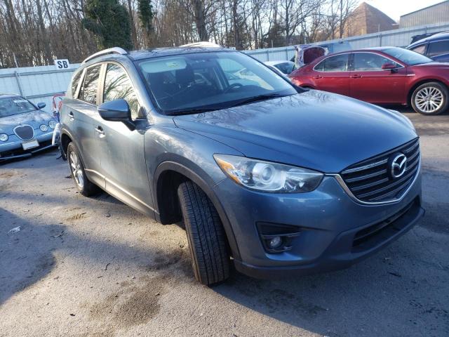 Photo 4 from auction – 2016 MAZDA CX-5 TOURI with VIN JM3KE4CYXG0764331