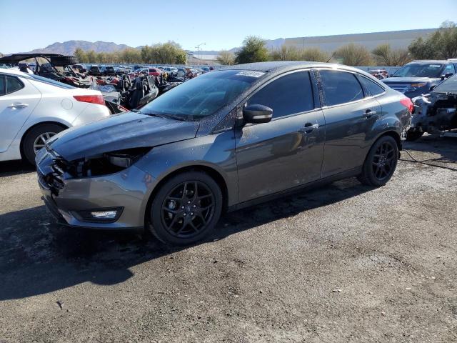 FORD FOCUS SE 2016 with VIN 1FADP3F21GL384036 - Photo from auction