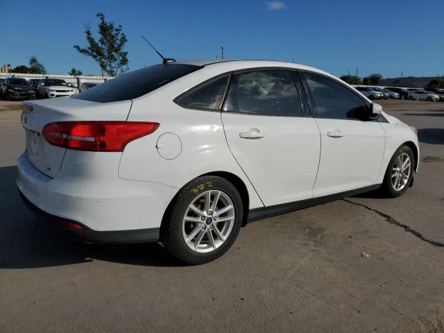Photo 3 from auction – 2016 FORD FOCUS SE with VIN 1FADP3F23GL291597