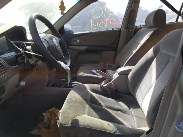 Photo 7 from auction – 2002 MAZDA PROTEGE DX with VIN JM1BJ225220530788
