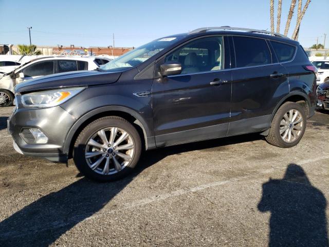 FORD ESCAPE TIT 2017 with VIN 1FMCU9J97HUD87312 - Photo from auction