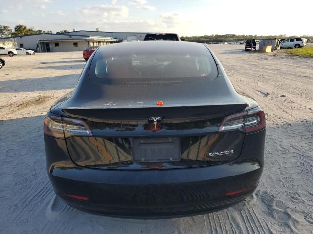 Photo 6 from auction – 2021 TESLA MODEL 3 with VIN 5YJ3E1EC7MF856216