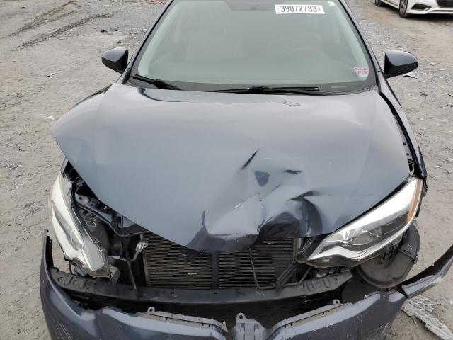 Photo 11 from auction – 2015 TOYOTA COROLLA L with VIN 2T1BURHEXFC399354