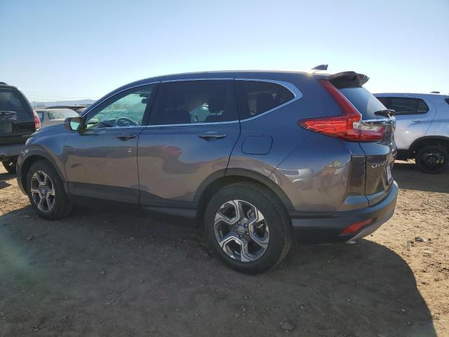 Photo 2 from auction – 2018 HONDA CR-V EX with VIN 7FARW1H55JE010865
