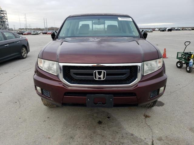 Photo 5 from auction – 2011 HONDA RIDGELINE with VIN 5FPYK1F21BB006042
