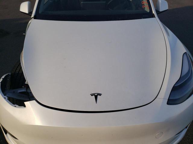 Photo 12 from auction – 2022 TESLA MODEL Y with VIN 7SAYGAEE0NF553137