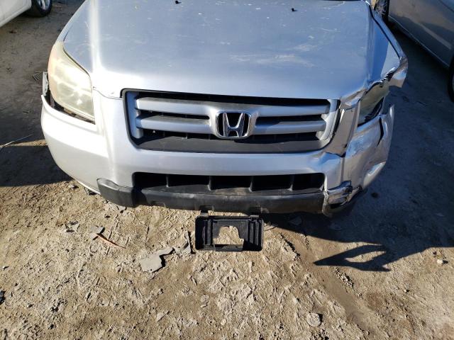 Photo 11 from auction – 2006 HONDA PILOT LX with VIN 2HKYF18196H555626