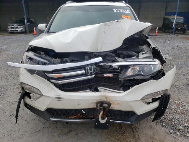 Photo 12 from auction – 2018 HONDA PILOT TOUR with VIN 5FNYF6H96JB016259