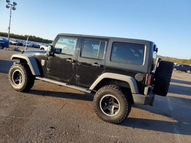 Photo 2 from auction – 2011 JEEP WRANGLER U with VIN 1J4HA6H11BL536547