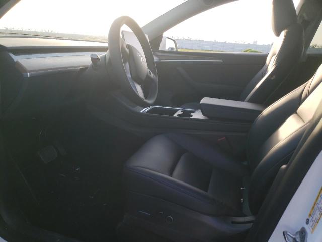 Photo 7 from auction – 2022 TESLA MODEL Y with VIN 7SAYGAEE0NF553137
