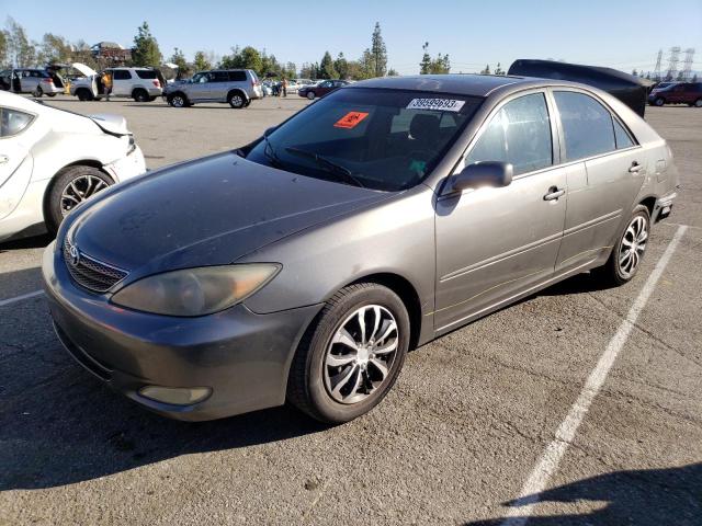 TOYOTA CAMRY LE 2002 with VIN JTDBF32KX20052312 - Photo from auction