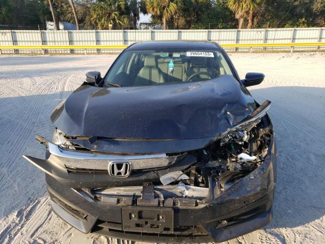 Photo 5 from auction – 2016 HONDA CIVIC EX with VIN 19XFC2F76GE094646