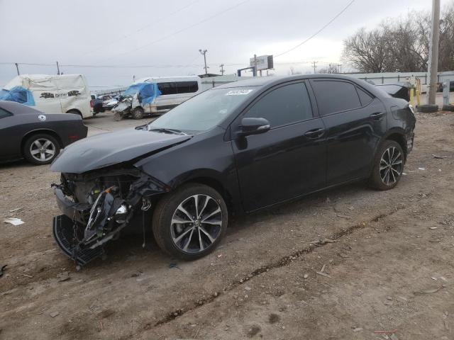 TOYOTA COROLLA L 2019 with VIN 5YFBURHE1KP923291 - Photo from auction