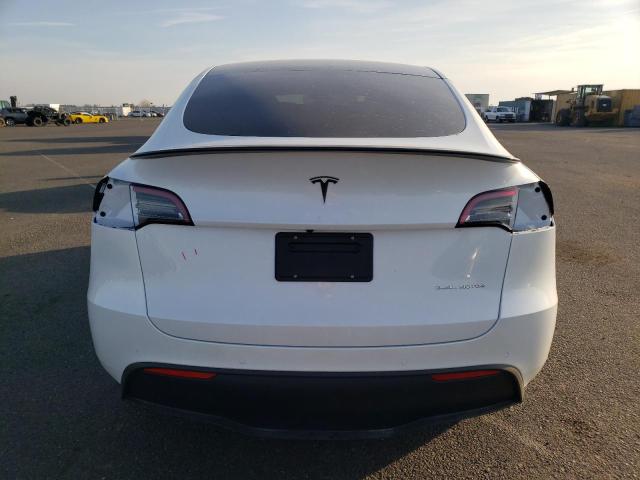 Photo 6 from auction – 2022 TESLA MODEL Y with VIN 7SAYGAEE0NF553137