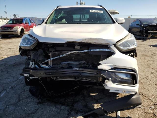 Photo 5 from auction – 2017 HYUNDAI SANTA FE S with VIN 5NMZU3LB6HH015589