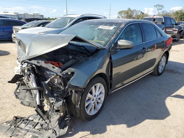 Photo 1 from auction – 2014 TOYOTA CAMRY HYBR with VIN 4T1BD1FK7EU104458
