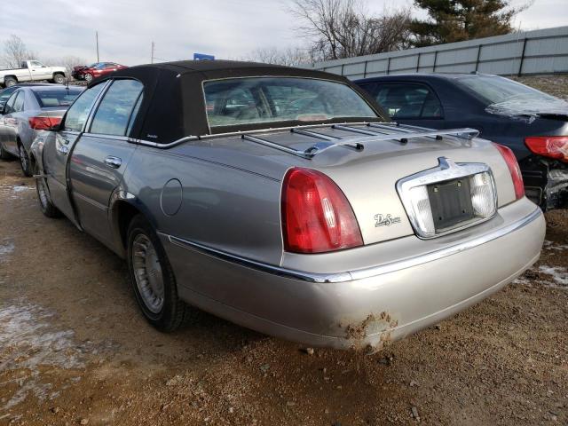 Photo 2 from auction – 2001 LINCOLN TOWN CAR E with VIN 1LNHM81W31Y733473