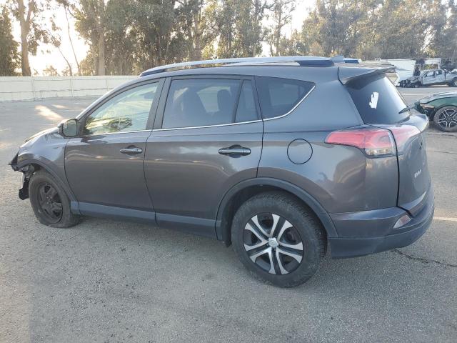 Photo 2 from auction – 2017 TOYOTA RAV4 LE with VIN JTMZFREV2HJ704074