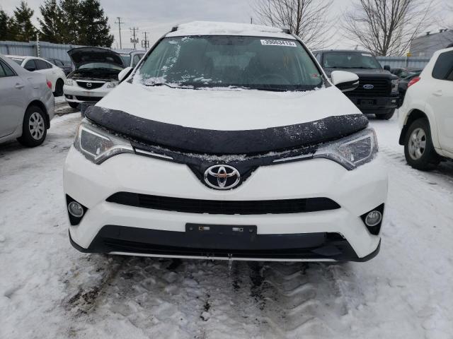 Photo 5 from auction – 2016 TOYOTA RAV4 XLE with VIN 2T3RFREV1GW531051