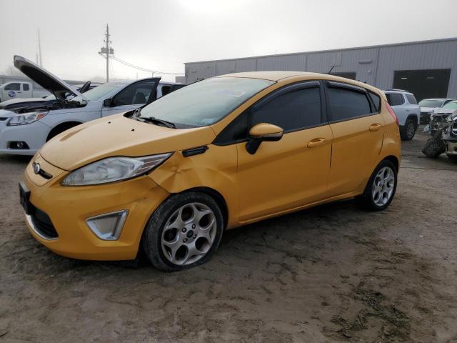 FORD FIESTA SES 2011 with VIN 3FADP4FJ8BM212946 - Photo from auction