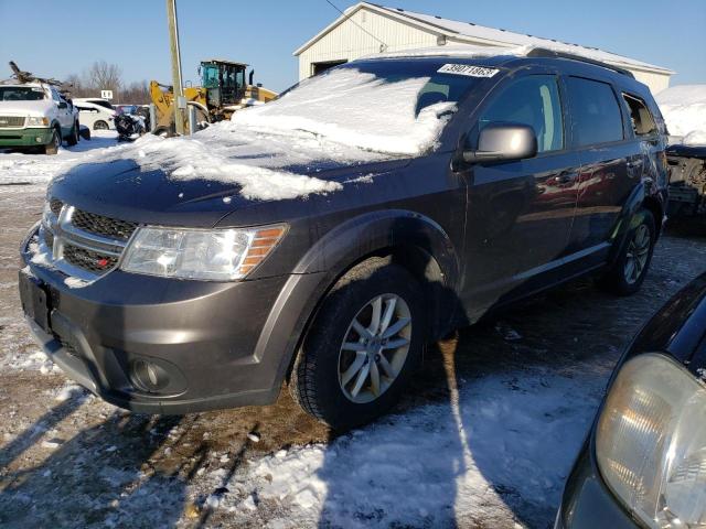 DODGE JOURNEY SX 2014 with VIN 3C4PDDBG9ET250979 - Photo from auction