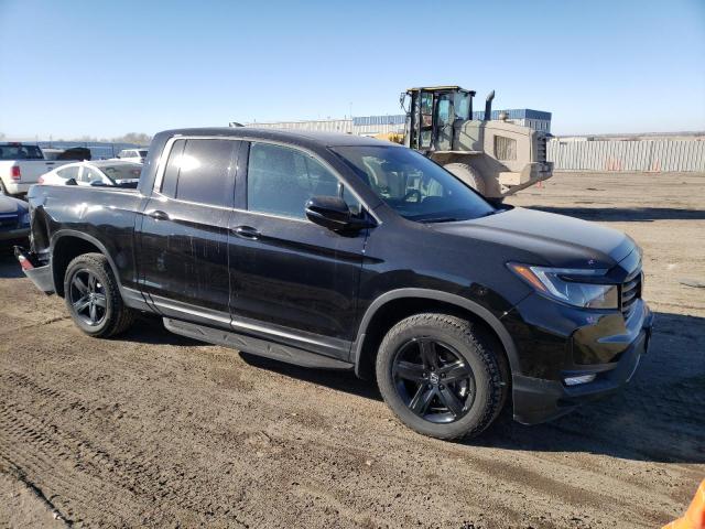 Photo 4 from auction – 2022 HONDA RIDGELINE with VIN 5FPYK3F87NB024730