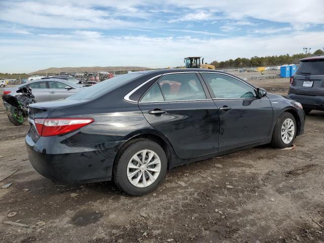 Photo 3 from auction – 2016 TOYOTA CAMRY HYBR with VIN 4T1BD1FK9GU194456
