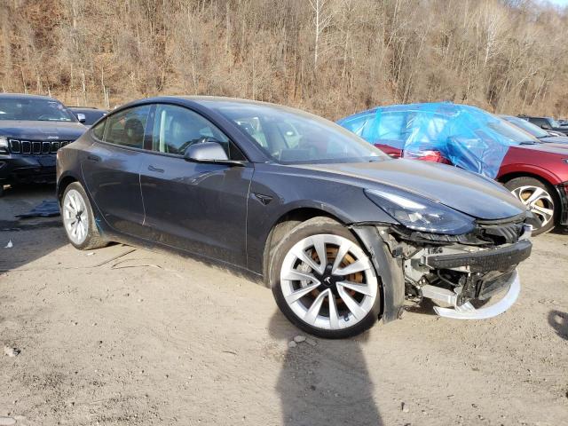 Photo 4 from auction – 2021 TESLA MODEL 3 with VIN 5YJ3E1EBXMF049647