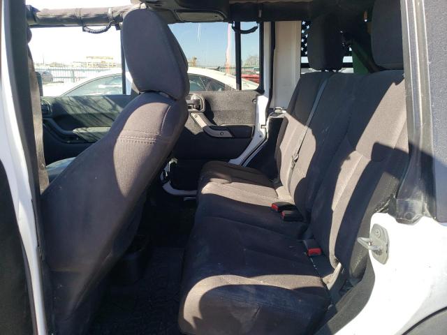 Photo 11 from auction – 2015 JEEP WRANGLER U with VIN 1C4BJWDG8FL549355