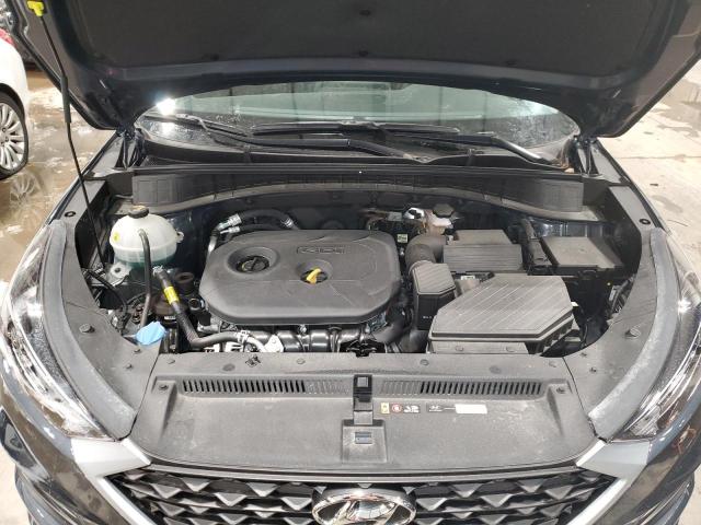 Photo 12 from auction – 2021 HYUNDAI TUCSON SE with VIN KM8J2CA45MU296869
