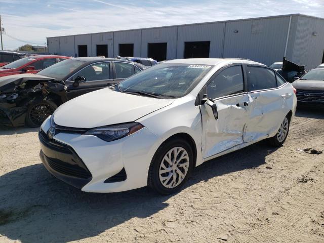 TOYOTA COROLLA L 2017 with VIN 5YFBURHE1HP573444 - Photo from auction