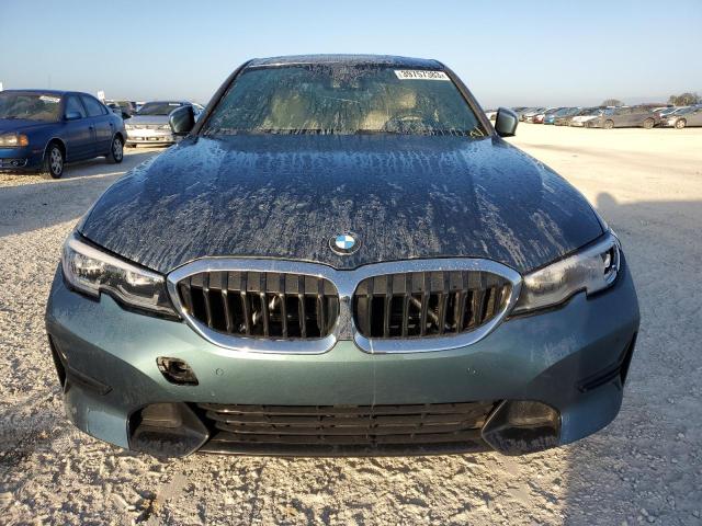 Photo 5 from auction – 2021 BMW 330I with VIN 3MW5R1J05M8B99796