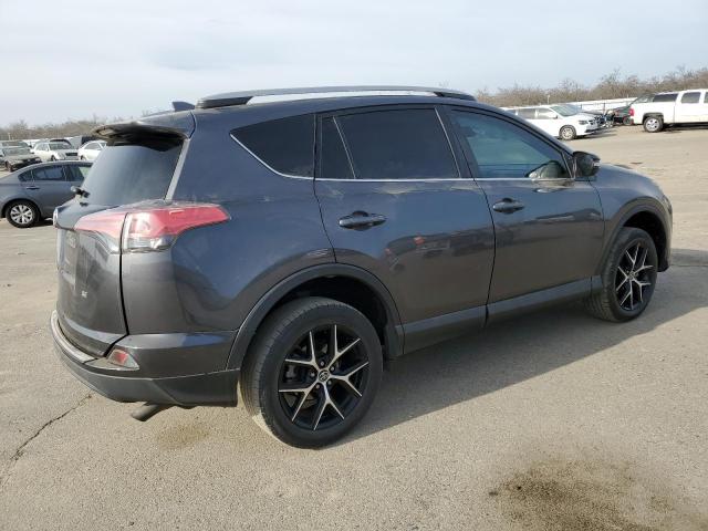 Photo 3 from auction – 2018 TOYOTA RAV4 SE with VIN 2T3NFREV9JW426084